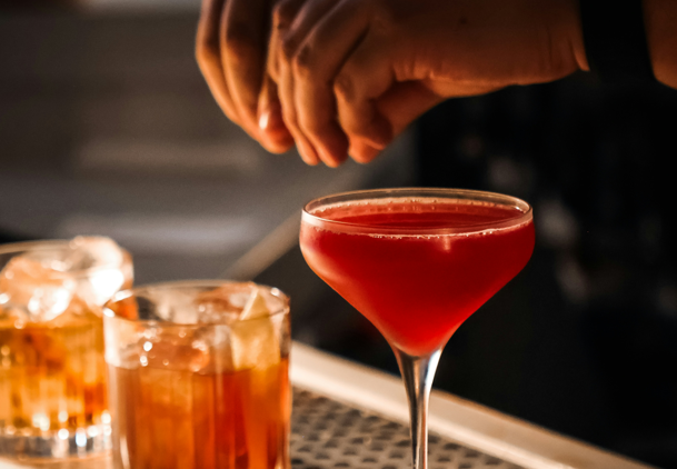Bartenders-serving-American-whisky-cocktails-during-American-Craft-Cocktail-Week-at-a-premium-bar-in-Mumbai