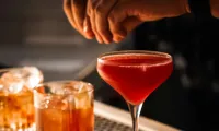 Bartenders-serving-American-whisky-cocktails-during-American-Craft-Cocktail-Week-at-a-premium-bar-in-Mumbai