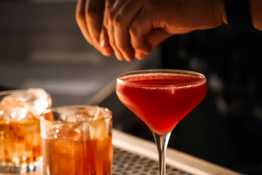 Bartenders-serving-American-whisky-cocktails-during-American-Craft-Cocktail-Week-at-a-premium-bar-in-Mumbai